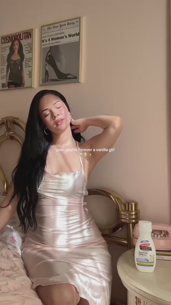 Woman using Palmer's Tahitian Vanilla Body Lotion